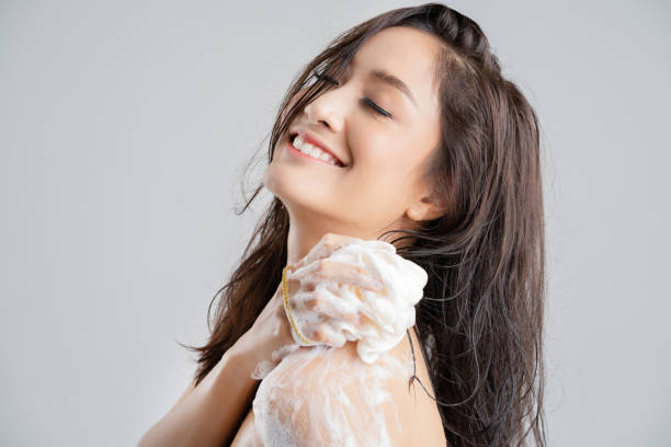 istock Asian woman being happy with the shower. Studio concept 1148220665
