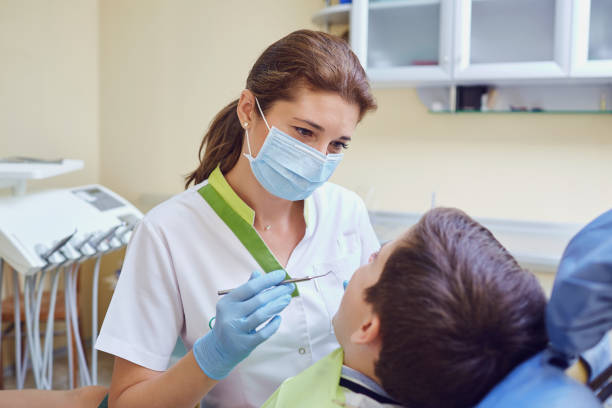 istock Dentist and child in the dental office. 1148222952
