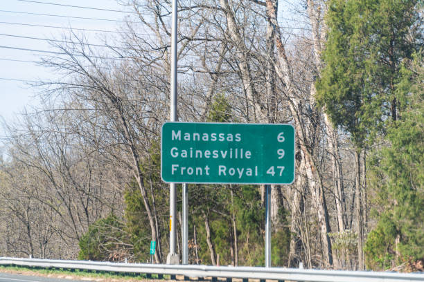 istock Road sign to Manassas, Gainesville and Front Royal along interstate highway 66 West in state of Virginia 1148224049