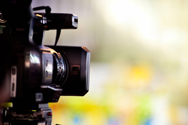 istock Video camera of journalist 1148224361