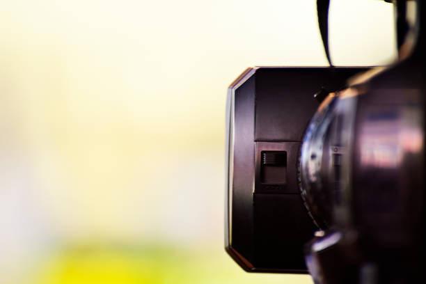 istock Video camera of journalist 1148225124