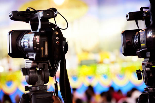 istock Video camera of journalist 1148225164