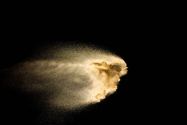 istock Brown dry river sand explosion isolated on black background. Abstract sand splash. 1148230627