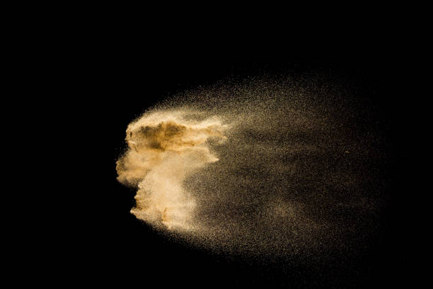 istock Brown dry river sand explosion isolated on black background. Abstract sand splash. 1148230648