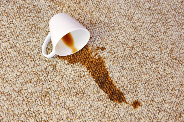 istock Cup of coffee fell on carpet. Stain is on floor. 1148230668