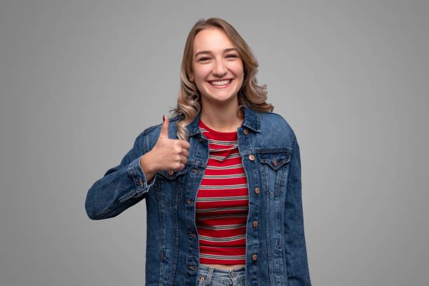 istock Excited teenager gesturing thumb up 1148231416
