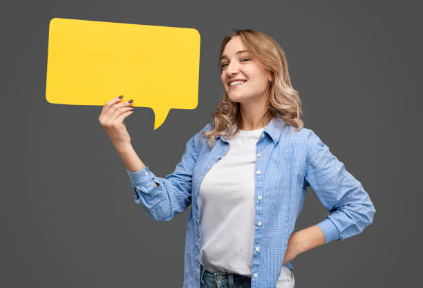 istock Confident woman with speech balloon 1148231662