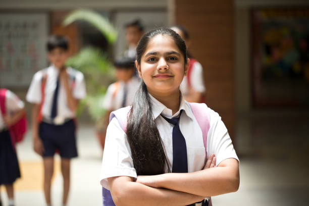istock School girl with arms crossed 1148232107