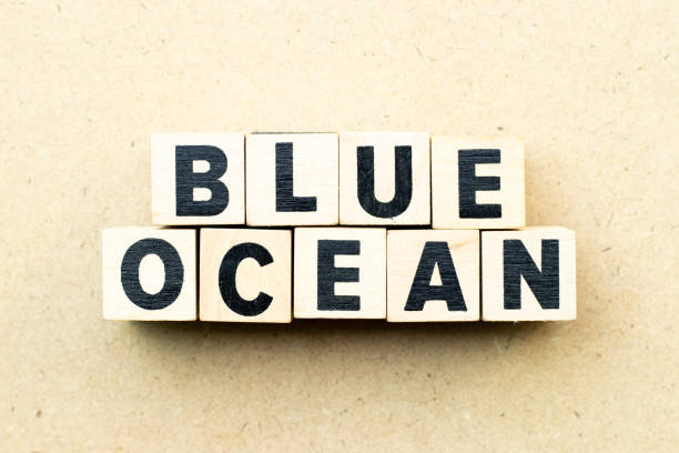 istock Letter block in word blue ocean on wood background 1148232857