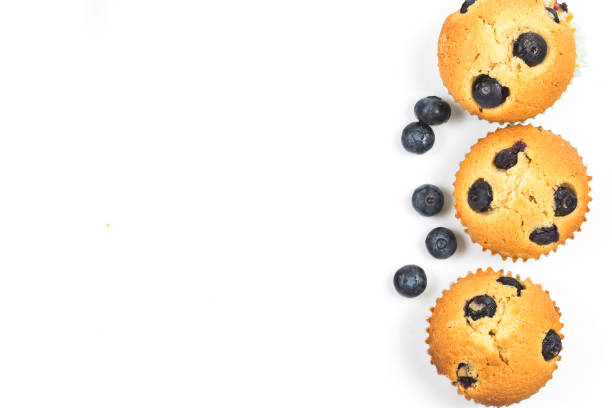 istock Blueberry muffins on white background 1148233916