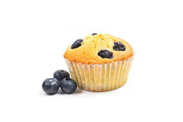 Photo of Blueberry muffins on white background