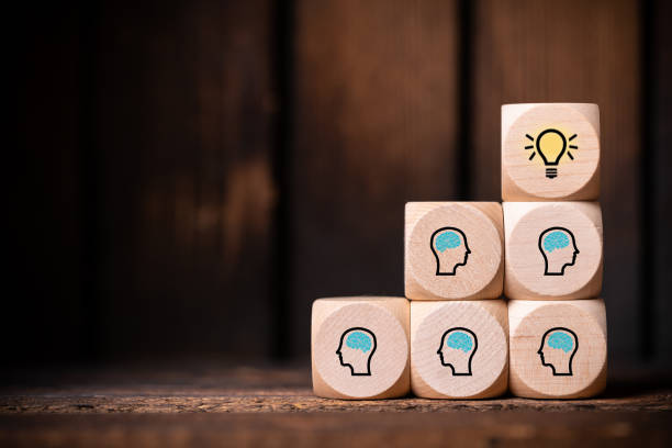 istock many people together having an idea symbolized by icons on cubes 1148234074