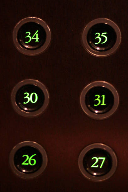 istock Buttons with green light numbers lift in the elevator. 1148235427