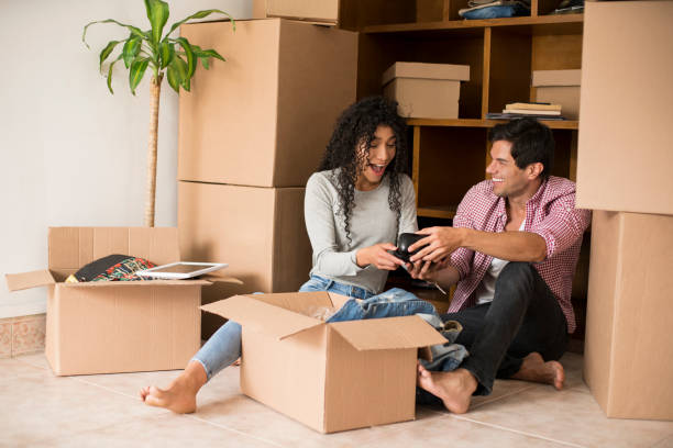 istock Couple packing to move house 1148235622