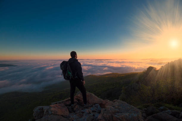 istock A man in mountain sunset autumn 1148239817