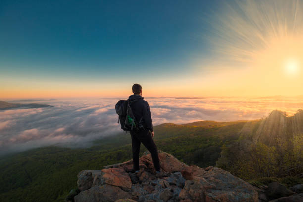 istock A man in mountain sunset autumn 1148239826