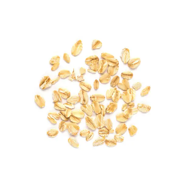 Photo of Uncooked oat flakes isolated