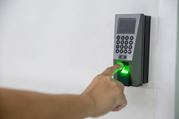 istock Finger scan on machine Security concept and safety. soft focus on hand scanning finger on machine concept. Businessman hand scanning finger on machine, 1148243448