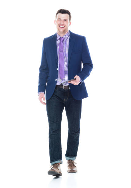 Close up of a luxurious blue leather shoes on a stylish businessman with a suit pared with pair of yellow socks.