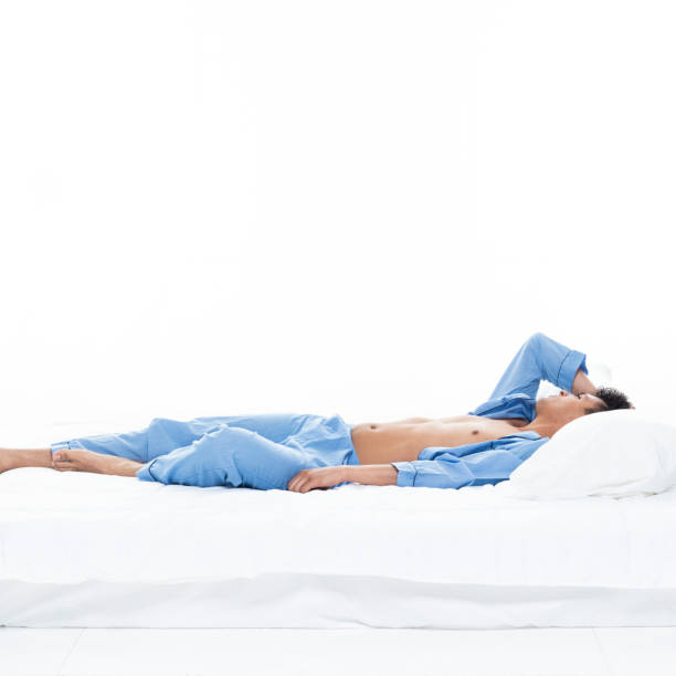 istock Sexy shirtless man in bed 1148244917