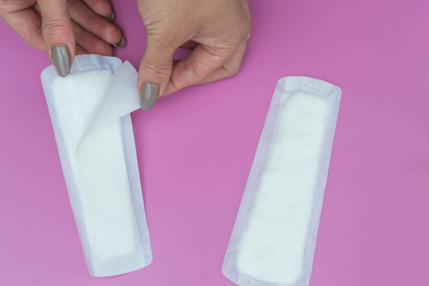 istock Hygienic napkin in female hands. 1148244978