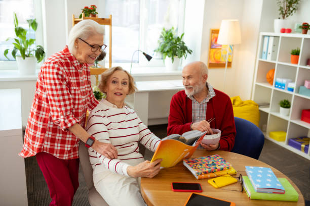 istock Happy pleasant woman visiting a reading club 1148246385