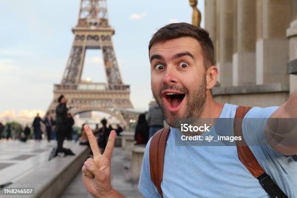 Ecstatic Man Taking A Selfie In The Eiffel Tower Paris Stock Photo - Download Image Now