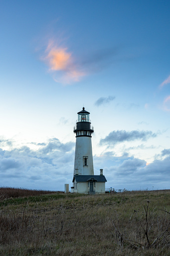 Orange Cloud Over Yaquina Head Lighthouse in morning light