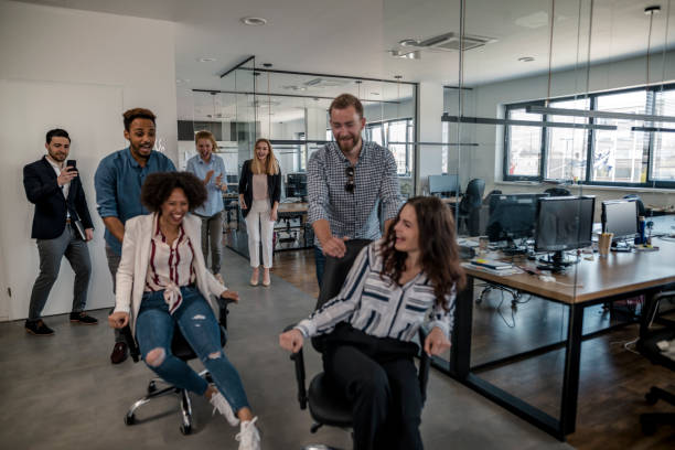 istock Coworkers having fun in the office 1148248904