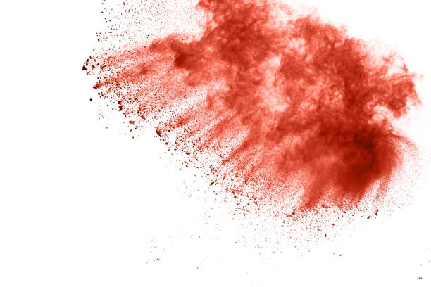 istock living coral color powder explosion on white background. Colored cloud. Colorful dust explode. Paint Holi. 1148249218
