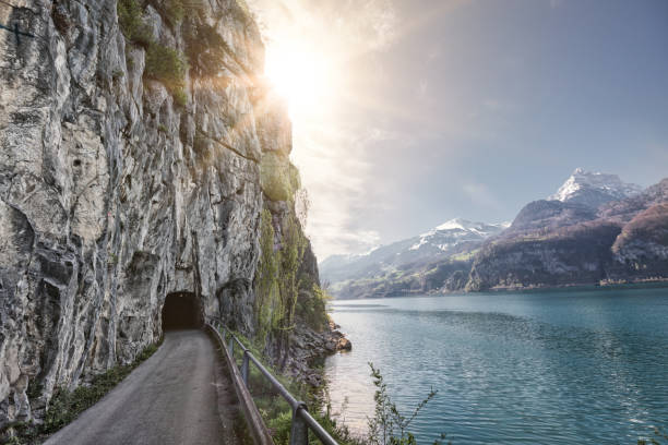 Alpi Apuane mountain road pass and tunnel view at sunset. Movie location in Carrara, Tuscany, Italy. Europe.