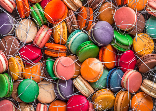 istock French close-up macarons large colorful overhead arrangement with silver straws 1148252803