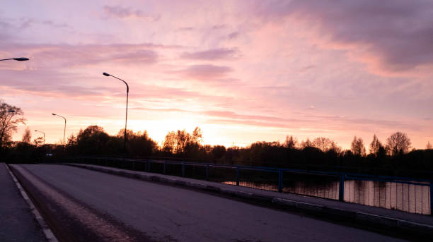 istock Bridge car at sunset. Road bridge in the evening. 1148255367