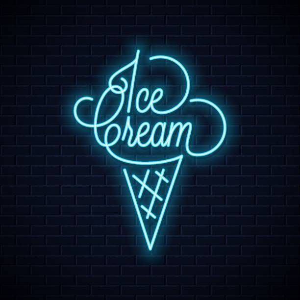 istock Ice cream in the waffle cone neon sign. Ice cream cone neon banner on wall background 1148257212