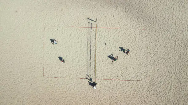 Beach volleyball top view. Sports and beach sports. Photographed from the drone. Aero photo filming