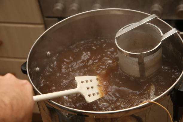 Brewing craft beer in a kitchen. Home brewing concept image.