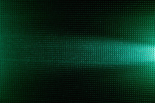 istock Horizontal white beam of light on a green checkered background 1148260643