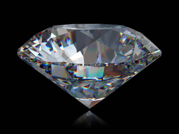 istock Close-up round cut diamond on black glossy background 1148264556