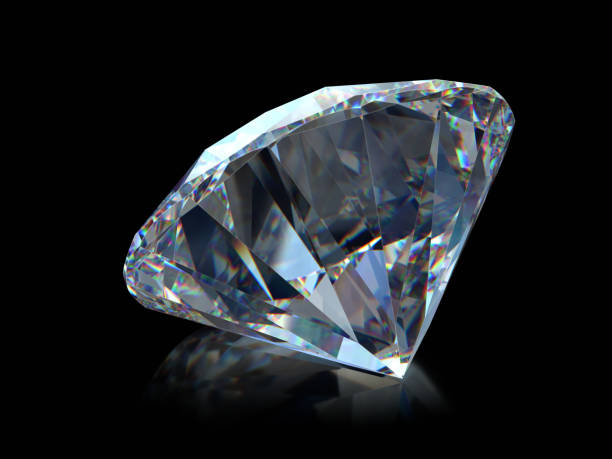 istock Close-up round cut diamond on black glossy background 1148264559