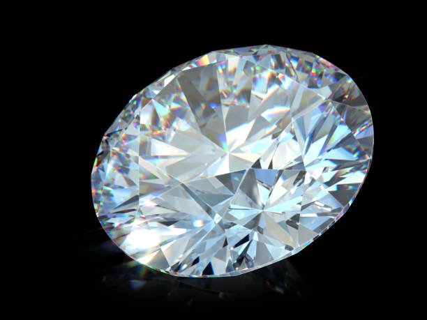 istock Close-up round cut diamond on black glossy background 1148264584