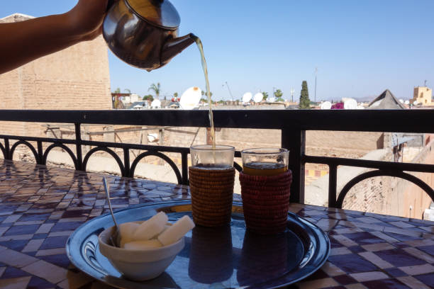 istock Traditional Moroccan mint tea with sweets served in a cafe in Marrakech, Morocco 1148279000