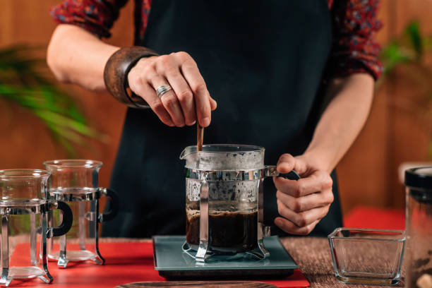istock Barista  Making French Press Coffee 1148279523
