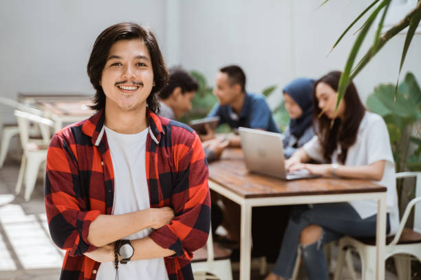 istock business entrepreneur smiling to camera 1148281072