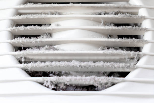 istock Extremely dirty and dusty white plastic ventilation air grille at home close up, harmful for health 1148285907