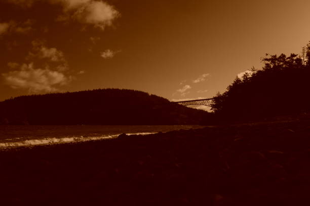 istock Sunrise On The Beach At Deception Pass State Park In Sepia 1148290110