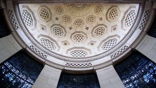 Ceiling at the entrance of Bush House London, UK - July 27, 2018: Ceiling above the gate of Bush House, a listed building, currently part of the Strand Campus of King's College London, previously the headquarters of the BBC World Service. university of london photos stock pictures, royalty-free photos & images