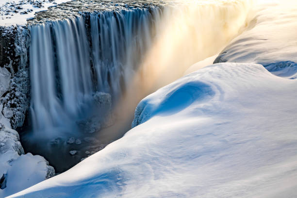 istock Special morning light falls into floor of Skutustadagigar waterfall 1148311259
