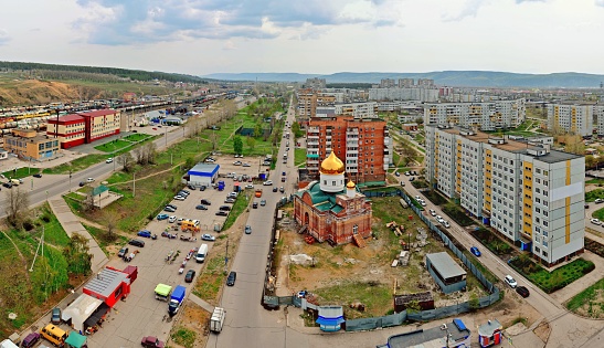 Morning view of the Serafim Sarovsky Temple under construction against the background of the panorama of the city of Togliatti and the \