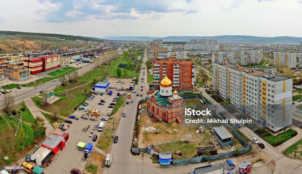Morning view of the Serafim Sarovsky Temple under construction. Morning view of the Serafim Sarovsky Temple under construction against the background of the panorama of the city of Togliatti and the "Zhigulevskoe More" railway station. Russia Stock Photo Morning view of the Serafim Sarovsky Temple under construction. Morning view of the Serafim Sarovsky Temple under construction against the background of the panorama of the city of Togliatti and the "Zhigulevskoe More" railway station. Russia Stock Photo