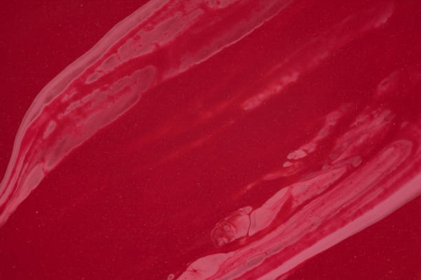 istock abstract background with pink and red nail polish 1148334022